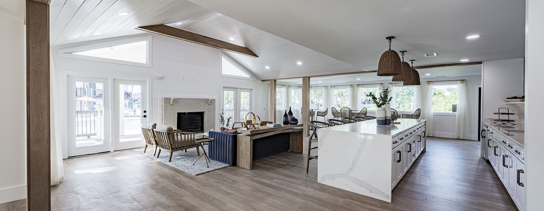 a clubroom with a kitchen area and a lounge area